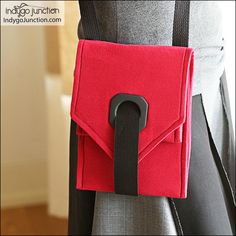 Ideal for the girl-on-the-go. Crossbody style bag features grommet & elastic closure to keep your items secure. Multiple pocket sizes fit everything from eReaders to cell phones. Perfect for vacation & travel. Size: 7-1/2" x 9" closed. Create with denim or quilting or home decorator weight cottons. Item Number: 75-1106-888 Original SKU: IJ1106CR