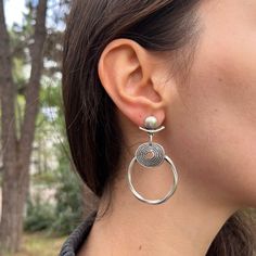 The silver hoop earrings for Nomada Bohemio were a must-have at the top of my list. I wanted to create a design that stands out with Bohemian and Ethnic details, rather than a standard and easily found basic model. As a result, it has become the most requested boho dangling earring model. Handcrafted with silver plated brass material, you won't feel these earrings on your ears all day and night, while others will certainly notice. Get ready to attract attention and admiration! Perfect Gift: Thes Bohemian Hoop Wrap Earrings, Bohemian Round Hoop Earrings, Hypoallergenic, Bohemian Adjustable Metal Wrap Earrings, Adjustable Bohemian Metal Wrap Earrings, Bohemian Round Hypoallergenic Hoop Earrings, Bohemian Metal Wrap Earrings With Ear Wire, Nickel-free Circle Hoop Earrings For Festival, Bohemian Silver Round Clip-on Earrings, Silver Bohemian Round Clip-on Earrings