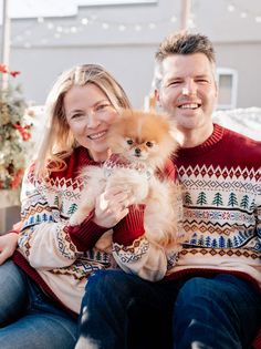 Couple and pomeranian in matching holiday sweaters Christmas Photo With Dog, Matching Dog And Owner Outfits, Christmas Card Photos, Dog And Owner, Bbq Shirt, Embroidered Bucket Hat, Holiday Sweaters, Twin Outfits, Matching Sweaters