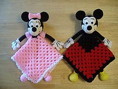 two crocheted mickey and minnie mouse dolls