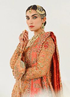 Farshi Lehenga Frock Dupatta Pakistani Bridal Dress is a heavily embellished attire that will give you a head-turning look on the big day. This stunning Pakistani Wedding Dress is adorned with embroidery, zari, and goldwork. Farshi Lehenga, Lehenga Frock, Bridal Lehenga Pakistani, Red Saree Wedding, Pakistani Bridal Lehenga, Pakistani Bridal Dress, Net Design, Coral Fabric, Pakistani Wedding Dress