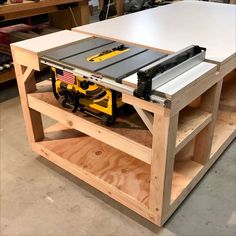 a workbench with a table saw on it