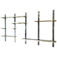 three metal shelvings are shown against a white background