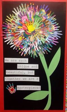 a flower made out of handprints on a bulletin board with the words, we are