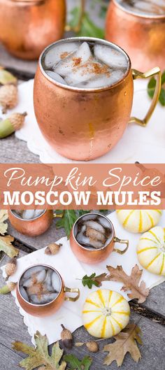 pumpkin spice moscow mules on a wooden table with leaves and small pumpkins in the background