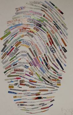 an image of a fingerprint made out of many different types of stickers on white paper