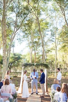 a couple getting married in the woods