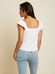 This tank is your sign to book that vacation. Featuring an elastic, square neckline, flutter sleeves and a relaxed fit in the breeziest double gauze. (This one comes in White.) Wear it with the Safa Skirt. | Women's Wyoming Tank in White | Ethical Essentials Hunter Bell, Summer Activity, Gauze Fabric, Double Gauze, Womens Clothing Stores, Short Jumpsuit, New Tops, Top Sales, Flutter Sleeves