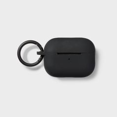 an apple airpods case with a keychain attached to the front and side