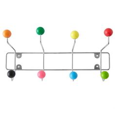 a metal rack with multi colored balls hanging from it's sides and two hooks on each side