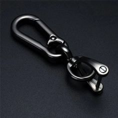 Description: Product name: car key ring Color: bright silver, bright blackMaterial: zinc alloy Size: the total length is about 9CM Function: key hook Packing list:Car key ring *1 Note:Light shooting and different displays may cause the color of the item in the picture a little different from the real thing. The measurement allowed error is +/- 1-3cm. Color: Black. Key Ring Holder, Key Chain Holder, Car Keychain, Automotive Interior, Key Ring, Key Rings, Phone Numbers, Key Chain, Phone Number