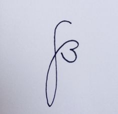 the letter f is drawn with black ink on white paper and has a heart in it