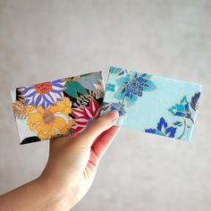 Sachi Manabe A business card and card case with a shining sense of style! From among the many obi fabrics, we have selected one that we think is the best! This card case is made of Tango crepe fabric with a beautiful luster and a gorgeous design. Everything is hand-painted and dyed in the same way as kimono. I picked out the best of the many obi fabrics and made it into a business card case. With two pockets and two folds, the case has excellent storage capacity and functionality. Why not carry Blue Rectangular Wallet For Gift, Rectangular Blue Wallets For Gifts, Blue Rectangular Wallet Perfect For Gift, Rectangular Blue Wallet Perfect For Gifts, Japan Crafts, Furoshiki Wrapping, Wrapping Cloth, Morpho Butterfly, Celebration Birthday