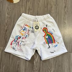 Limited Edition Fewocious Nft Artist Collaboration For Madhappy Super Soft White Fleece Sweatpant Shorts With All Over Hand Painted Print Design By Fewocious Size M Oversized Fit Matching Crewneck Available White Graphic Print Athleisure Bottoms, White Sporty Sweatpants With Graphic Print, Sporty White Sweatpants With Graphic Print, Graphic Print Short Bottoms For Loungewear, White Streetwear Bottoms With Elastic Waistband, White Graphic Print Pants For Loungewear, White Graphic Print Pants For Streetwear, White Graphic Print Shorts For Loungewear, White Relaxed Fit Bottoms With Graphic Print