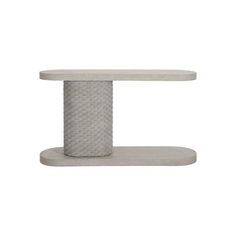 a white table with a grey base and a round shelf on the top that is made out of concrete