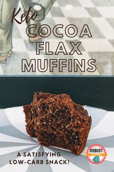 a close up of a piece of food on a plate with the words keto cocoa flax muffins