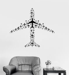 an airplane wall decal is shown in black and white