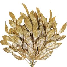 a bunch of gold colored leaves on a white background