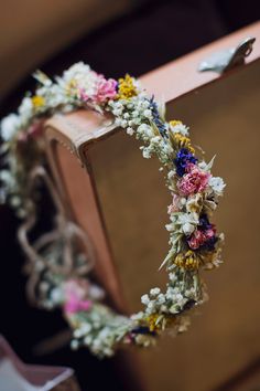 an image of a flower crown on top of a mirror