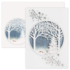 two greeting cards with trees and snowflakes on them, one in the shape of a circle