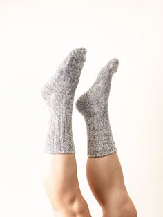 World's Softest Collection is known to be the softest socks you'll ever slip on. The Weekend Collection includes the Ragg Crew socks in a light gray color. Perfect for yourself or someone special. Size: Women's 6-10.Materials: 99% Polyester, 1% Spandex.Care Instructions: Wash inside out with cold water. These socks come with a 1-year guarantee from the manufacturer-refer to the product tag. The Crescent Sock Company was founded in Niota, TN in 1902, under the leadership of the same family for over 100 years. The emphasis on family and community is the cornerstone of all they do. It is a certified Woman-owned business. Soft Gray Casual Socks, Casual Soft Gray Socks, Cozy Soft Gray Socks, Cozy Gray Comfortable Socks, Cozy Snug Gray Socks, Soft Gray Winter Socks, Snug Gray Winter Socks, Cozy Gray Socks For Stocking Stuffers, Warm Gray Socks For Fall