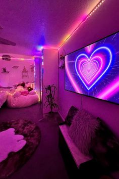 a room that has some lights on the walls and purple lighting in the ceiling above it