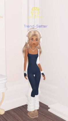 a doll is standing in a room with white walls and wood flooring, wearing a blue jumpsuit