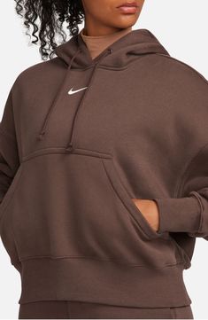 Supersoft fleece means all-day comfort in a dropped-shoulder hoodie perfect for relaxing at home or heading to the gym. 24" length (size Medium) Drawstring hood 80% cotton, 20% polyester Machine wash, tumble dry Imported Brown Nike Hoodie, Sweaters Nike, Nike Sportswear Phoenix Fleece, Nike Cropped Hoodie, Nike Quarter Zip, 2024 Wishlist, Brown Hoodie, Hoodie Aesthetic, Nike Sweaters