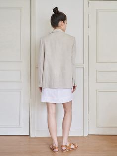 This is a casual and refined jacket that is made out of high quality cotton and linen blend fabric. With design detail of relaxed silhouette that fits multiple styling and light weight without lining, it gives a trendy and refined look. - Cool touch of linen blend fabric- Light weight without lining- Relaxed silhouette Beige Linen Outerwear For Work, Neutral Linen Outerwear For Work, Tailored Linen Outerwear For Spring, Linen Notch Lapel Outerwear For Spring, Elegant Relaxed Fit Linen Outerwear, Chic Tailored Linen Outerwear, Chic Linen Outerwear For Work, Neutral Linen Blazer For Work, Modern Linen Outerwear With Lapel Collar