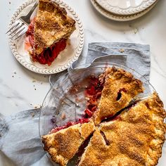 two plates with slices of pie on them