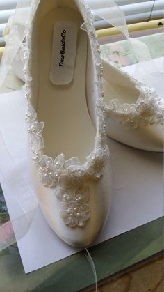 Beautiful Flat shoes for the bride who prefers feminine elegant flats! US Sizes: 5 to 10, and *11 & 12 (see notes) THESE SHOES DESIGNS ARE HAND EMBELLISHED TO ORDER THEREFORE THEY CAN'T BE RETURNED OR EXCHANGED I'LL MAKE ALL THE EFFORTS TO HELP YOU OBTAIN THE RIGHT SIZE; WHEN IN DOUBT OF RIGHT FIT, YOUR INSTEP SHOE SIZE MEASUREMENT CAN BE VERIFIED BEFORE OR AFTER PLACING YOUR SHOES ORDER, JUST ASK ME FOR HELP. THANK YOU! When ordering please consider the following: casual shoes, athletic sho Satin Wedding Shoes, Ballet Style, Elegant Flats, Wedding Flats, Ballet Fashion, Womens Wedding Shoes, Satin Wedding, White Flats, Lace Flowers