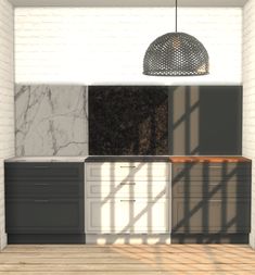 a kitchen with marble counter tops and cabinets