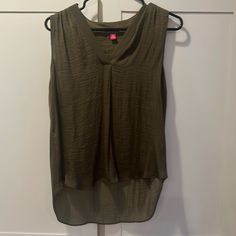 Nwt Vince Camuto Sleeveless Top. Listed As Oasis Green. Fabric Has A Slight Sheen Versatile V-neck Tank Top For Beach, Versatile Beach Tank Top, Casual Sleeveless Olive Tops, Casual Olive Sleeveless Top, Sleeveless Olive Top For Summer, Green Sleeveless Vest For Layering, Green Sleeveless Tank Top For Layering, Green Fabric, V Neck Tops