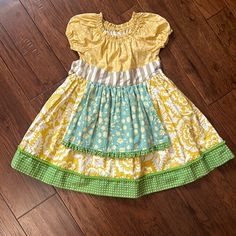 Such A Sweet Little Dress That My Daughter Never Got A Chance To Wear. Washed Once And Never Worn. Smoke And Pet Free Home:) Cute Patchwork Party Dress, Sweet Green Cotton Dress, Cute Short Sleeve Patchwork Dresses, Yellow Sweet Dress With Ruffles, Cute Patchwork Dress For Dress-up, Fitted Patchwork Dress For Dress-up, Playful Fitted Patchwork Dresses, Short Sleeve Patchwork Dress For Dress-up, Green Ruffled Dress For Play