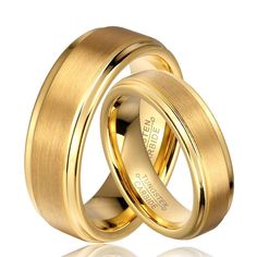 two gold wedding rings with the word love written on each one and an inscription that reads,