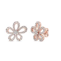 These intriguing pair of Bouquet Studs capture the intricate details of a blooming bouquet, embellished with diamond accents. The asymmetrical design of the diamond stud earrings make them a versatile choice that effortlessly transitions from casual to formal settings. Rose Gold Flower Shaped Diamond Earrings For Formal Occasions, Formal Flower Shaped Brilliant Cut Earrings, Elegant Diamond Flower Earrings With Sparkling Stones, Formal Flower Earrings With Prong Setting, Formal Flower-shaped Earrings With Prong Setting, Rose Gold Diamond Flower-shaped Earrings, Formal Flower Diamond Earrings, Luxury Flower Shaped Diamond Wedding Earrings, Flower-shaped Earrings With Diamond Accents For Wedding