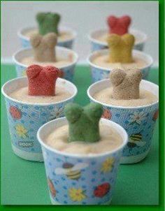 there are many small cups that have teddy bears in them