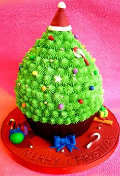 a cupcake decorated like a christmas tree