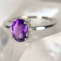 Say hello to your new gorgeous Amethyst Solitaire Ring! The natural Amethyst oval cut faceted crystal is set on a sterling silver frame with four prongs and an open back design. This allows light to flow into the Amethyst crystal and radiate you with blissful purple vibes. Amethyst brings tranquility and serenity to help you during life's pivotal moments.  Gift this beautiful ring to a loved one or make this purple genuine Amethyst crystal ring a treasured part of your crystal jewelry collection February Pisces, Amethyst Protection, Round Solitaire Ring, Round Solitaire Rings, February Birthstone, Crystal Ring, Purple Crystals, February Birth Stone, Beautiful Ring