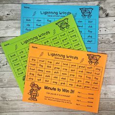 three printable learning cards with words and pictures on them, sitting on a wooden surface