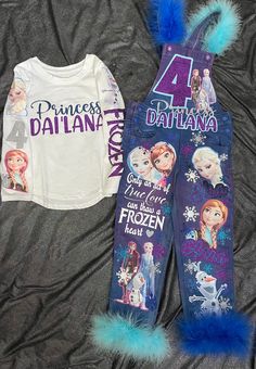 two frozen princess pajamas are laying next to each other