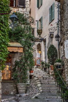 an old building with stairs leading up to it and the words saint paul de vence france