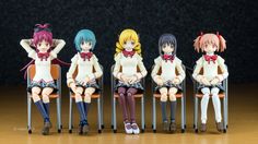 five anime dolls sitting in chairs with their hands on their hipss and legs crossed