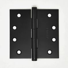 a black door hinge with three holes on the front and one hole in the back