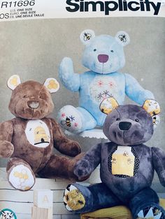 two teddy bears sitting next to each other