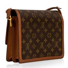 Crafted from Louis Vuitton's iconic monogram canvas, the Raspail is a true must-have for any vintage lover. This stunning piece is the perfect companion to accompany you throughout your day. Hold all your essentials comfortably inside while remaining sleek, stylish and sophisticated. That go-to accessory you don't even have to think about, the Raspail is a bag you'll have for life. Whether you pair this piece with jeans and a basic tee or trousers and a simple jumper, the Raspail is the perfect compliment to any casual look. Timeless and classic, this vintage gem will remain in style and in your wardrobe forever. SPL Exterior Monogram canvas Terra cotta cross- grain leather Adjustable Short looping strap Brass hardware edges Single flap Frontal turn lock Very good vintage condition - some Timeless Handbag, Vintage Lover, Luxe Fashion, Exclusive Bag, Basic Tee, Terra Cotta, Embossed Logo, Brass Hardware, Leather Interior