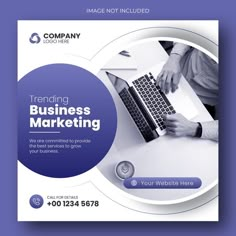 a blue and white business flyer with a laptop on the table in front of it