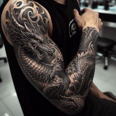 a man with a dragon tattoo on his arm