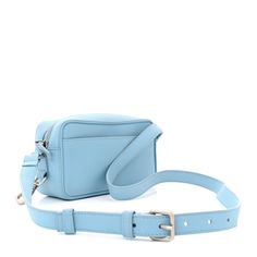 This is an authentic JACQUEMUS Smooth Calfskin Le Baneto in Light Blue. This stylish crossbody is crafted of smooth leather in blue. The shoulder bag features silver hardware and a leather strap. The top zipper opens to a beige fabric interior with a leather patch pocket. Beige Fabric, Orange Bag, Leather Patches, Silver Hardware, Pale Blue, Smooth Leather, Patch Pocket, Calf Skin, Leather Straps