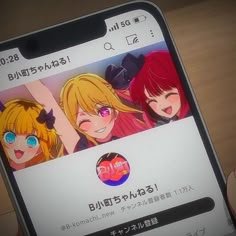 an iphone screen with anime characters on it